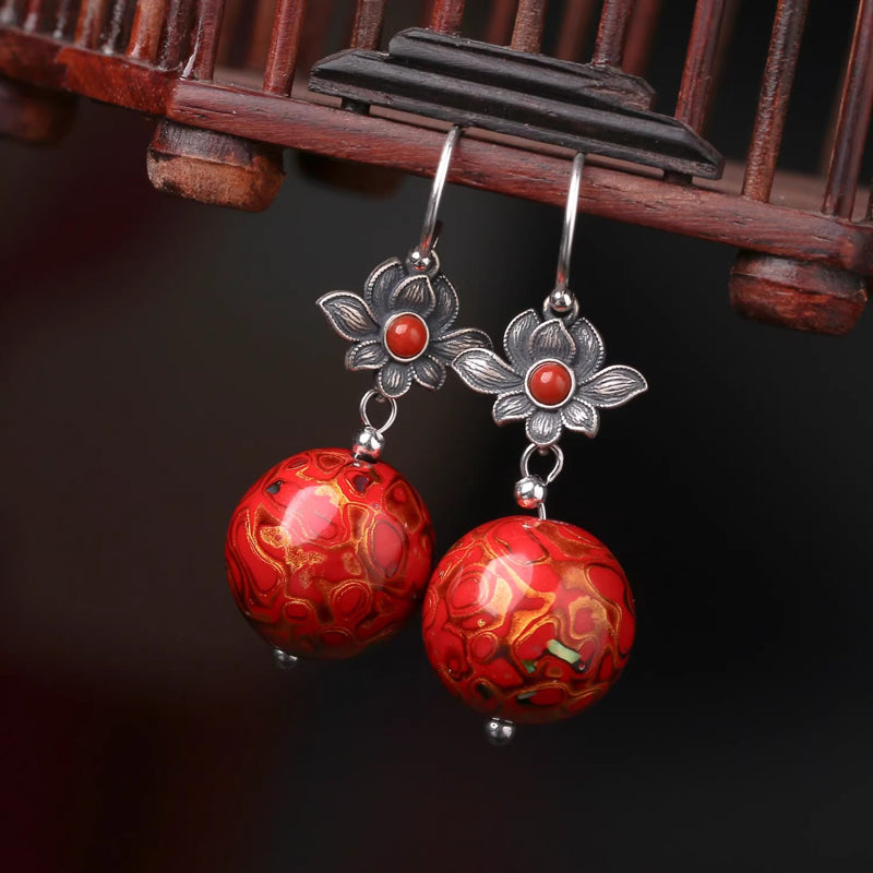 Red ancient - style earrings made of lacquer