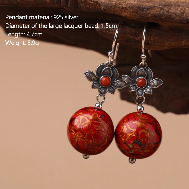 Red ancient - style earrings made of lacquer