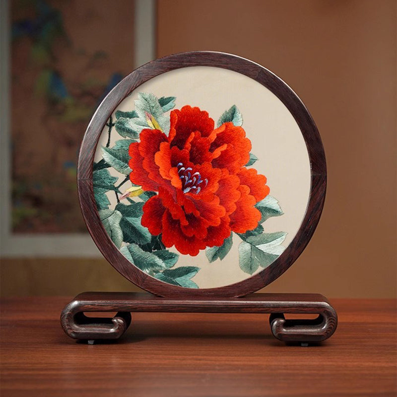 Suzhou embroidery featuring Chinese landscapes, flowers and plants