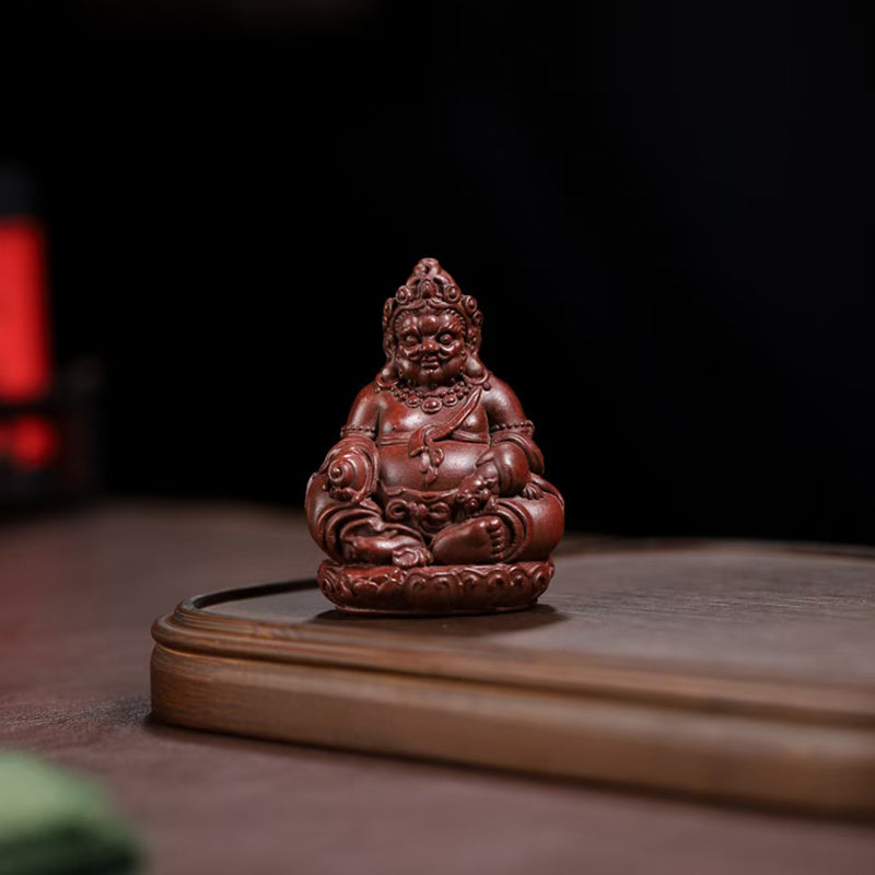 Zi Sha tea pet Cai Shen attracts wealth and treasures.