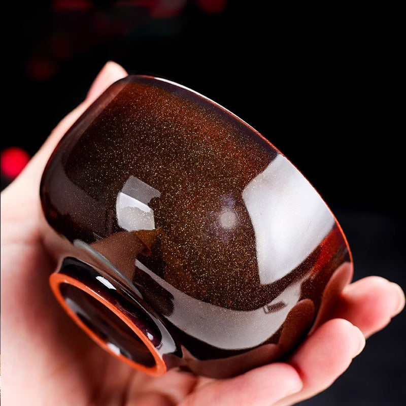 Kiln Variation Flowing Sand Gold Host Cup - Jianzhan