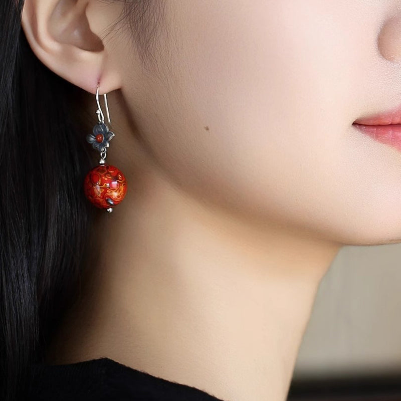 Red ancient - style earrings made of lacquer