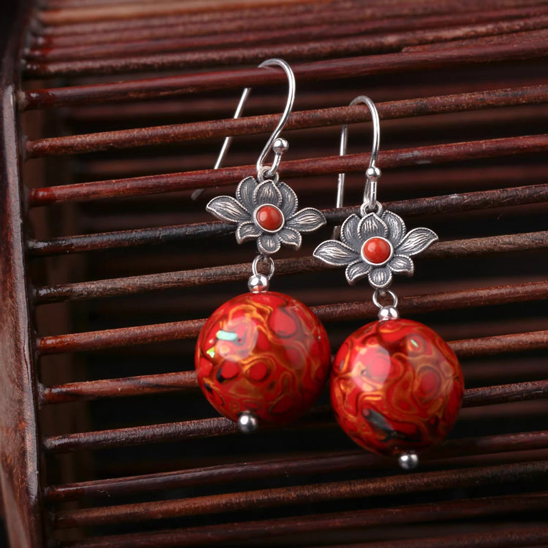 Red ancient - style earrings made of lacquer