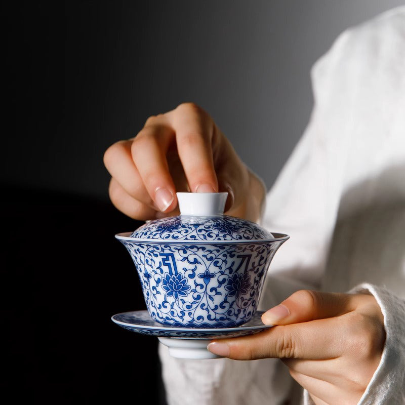 Blue and white porcelain and white porcelain lidded bowl