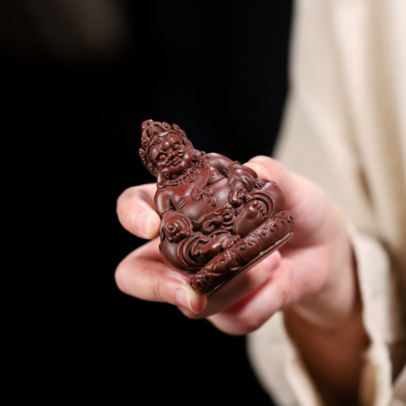 Zi Sha tea pet Cai Shen attracts wealth and treasures.