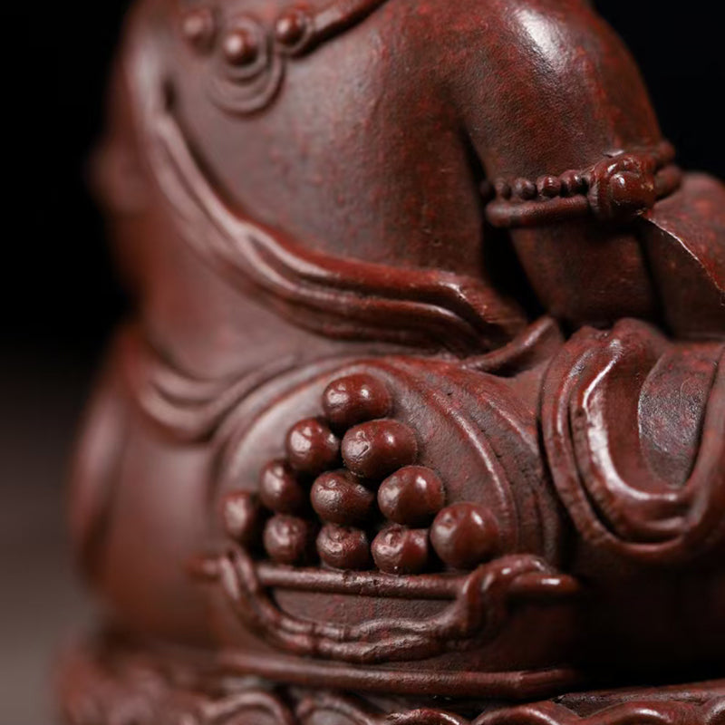 Zi Sha tea pet Cai Shen attracts wealth and treasures.