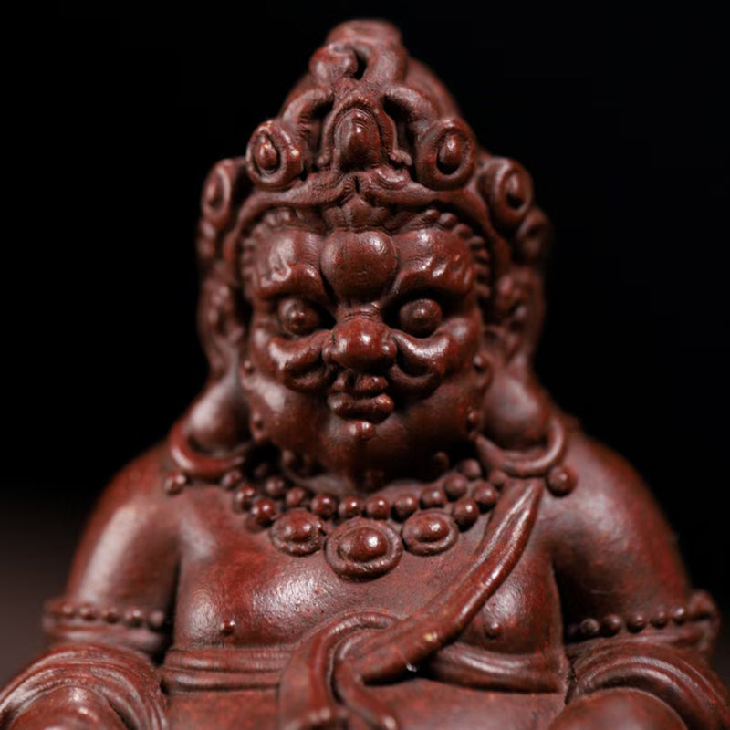 Zi Sha tea pet Cai Shen attracts wealth and treasures.