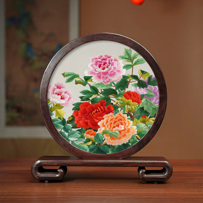 Suzhou embroidery featuring Chinese landscapes, flowers and plants